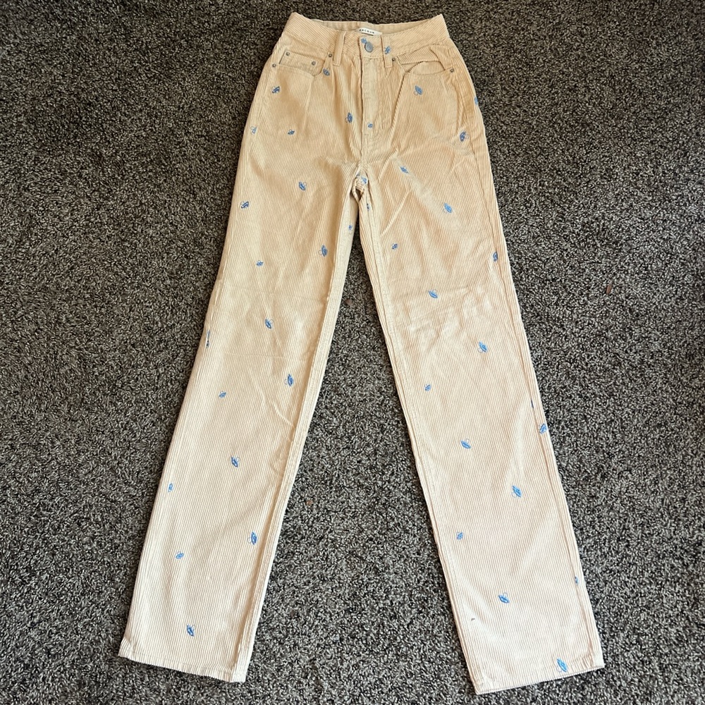 PacSun Corduroy Pants with Blue Mushroom Embroidery
• High-rise
• Never worn